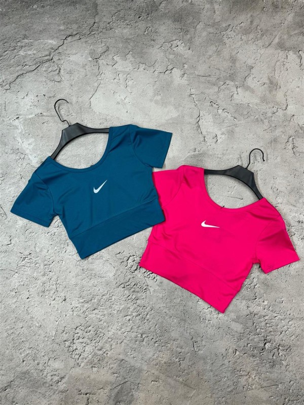 كراپ ورزشي زنانه پشت ضربدري NIKE