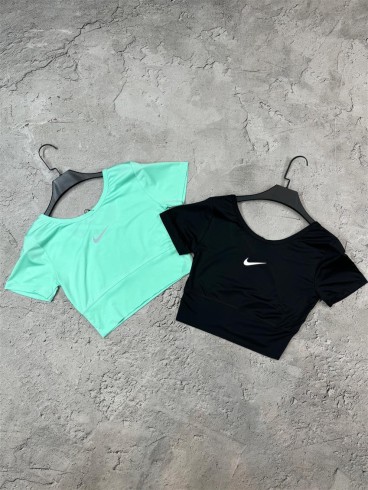 كراپ ورزشي زنانه پشت ضربدري NIKE