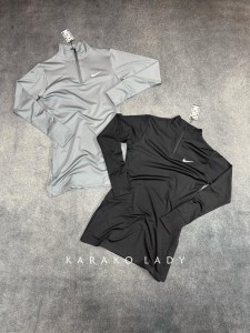 تونيك ورزشي زنانه نيم زيپ چاكدار NIKE