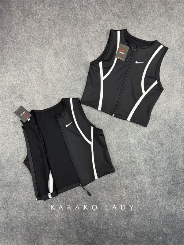 كراپ ورزشي زنانه حلقه اي زيپدار NIKE