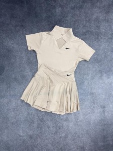 ست ورزشي زنانه زنانه نيم تنه و دامن seven NIKE