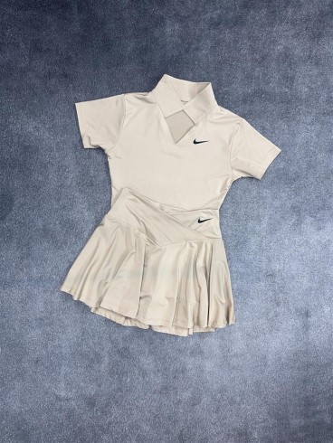ست ورزشي زنانه زنانه نيم تنه و دامن seven NIKE