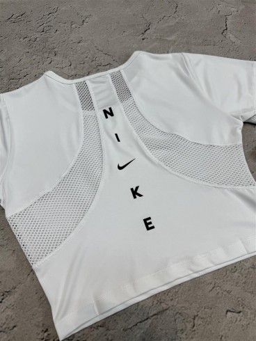 كراپ ورزشي زنانه پشت تور NIKE