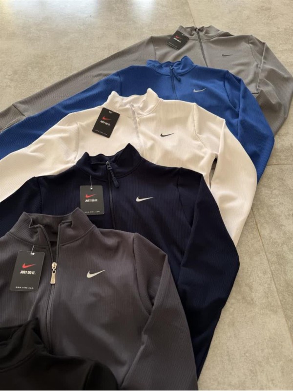 كراپ ورزشي زنانه استين بلند زيپدار NIKE