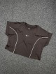 كراپ ورزشي زنانه استين كوتاه پاكتي NIKE
