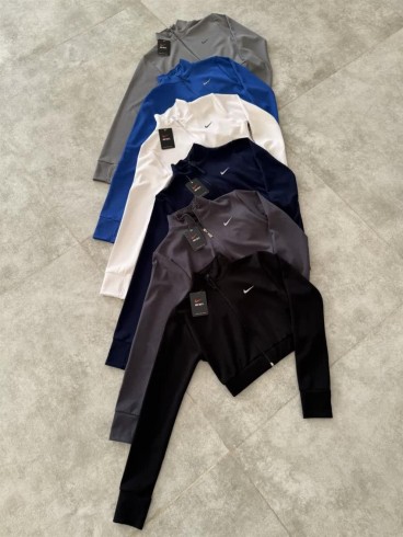 كراپ ورزشي زنانه استين بلند زيپدار NIKE